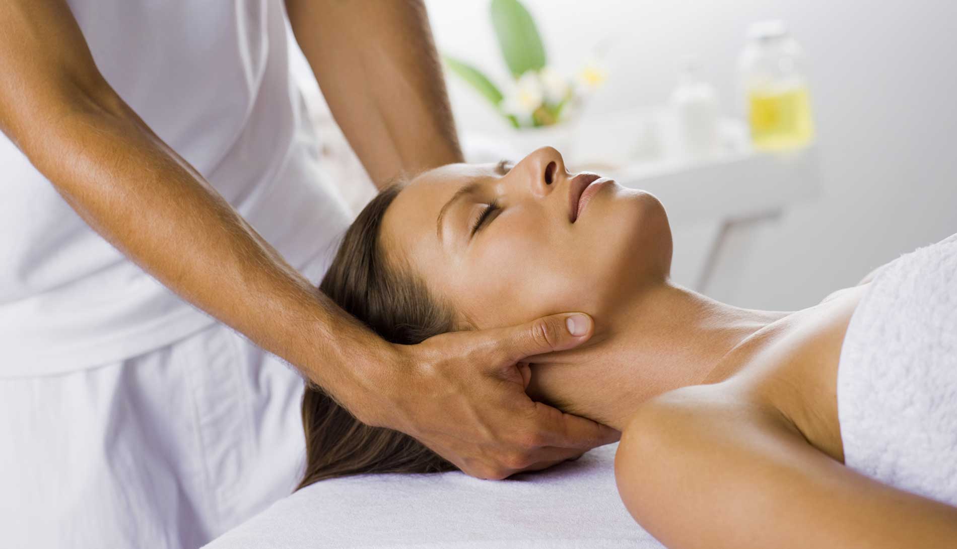 Woman receiving neckrub