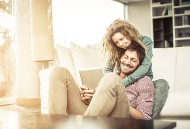 couple using tablet at home