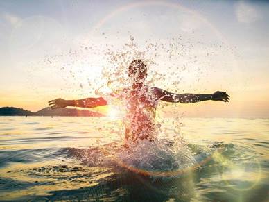 man emerging from sea