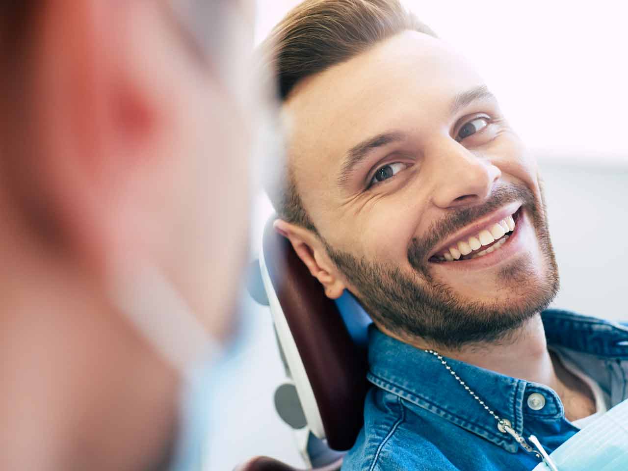 man smile white teeth