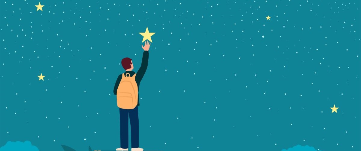 Man hand lifting up a school boy to reach for the star