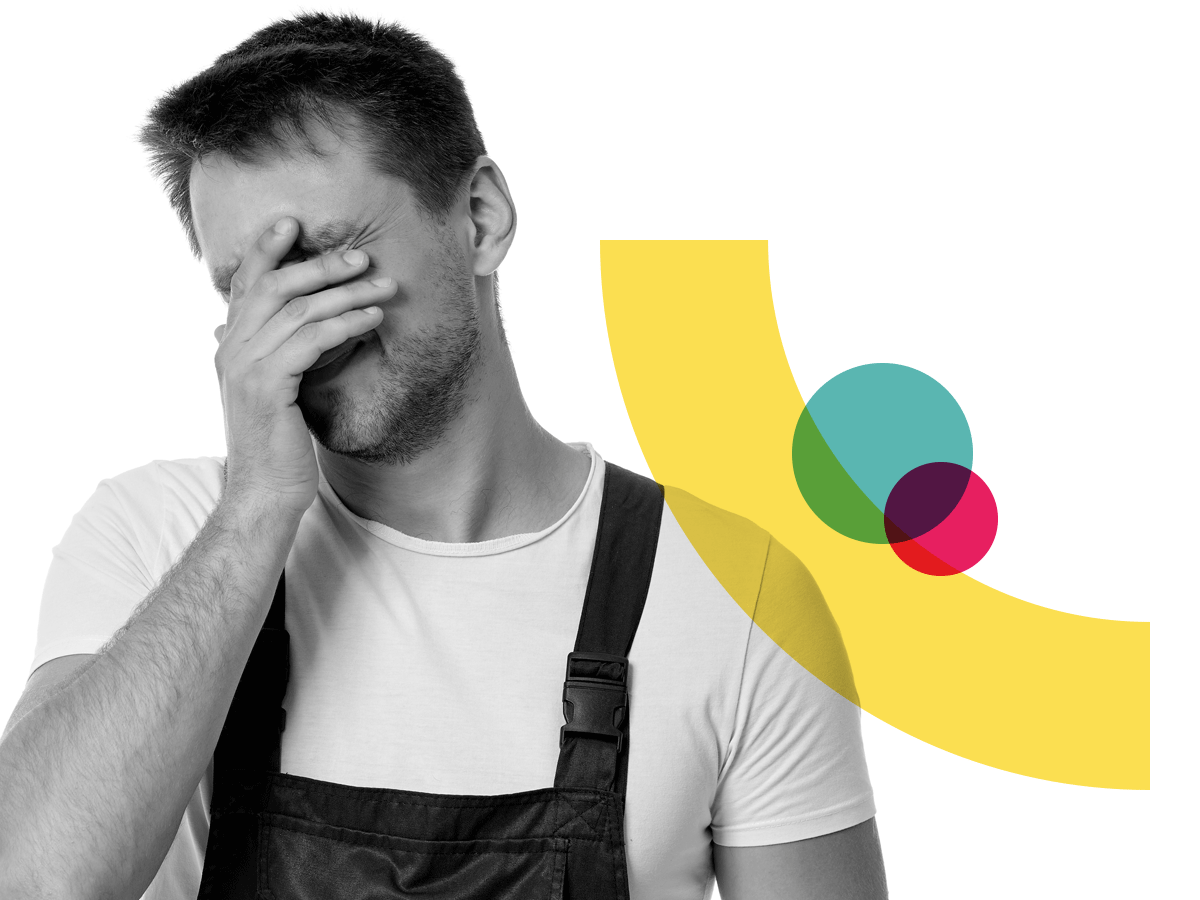 Man with his hand on his face, worried