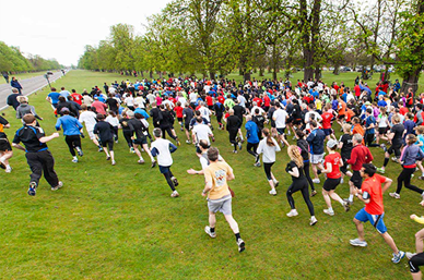 Aerial view of people running in park