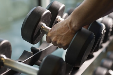 Hand lifting a dumbell