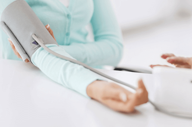 Patient having blood pressure taken